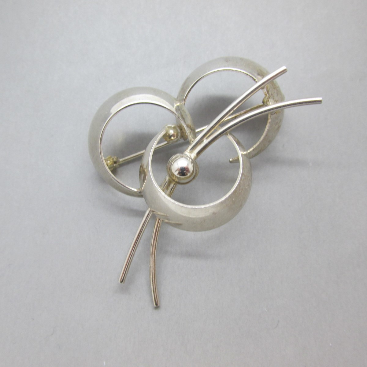 NE FROM MODERNIST SILVER BOUQUET BROOCH